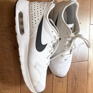 Women’s White Nike Tavas size 9.